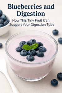 Fresh blueberries in a ceramic bowl on a wooden table, highlighting their vibrant color and digestive benefits.