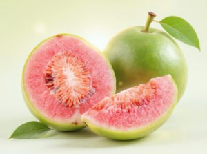 Fresh guavas with sliced pieces showing the pink interior, highlighting digestive health benefits.